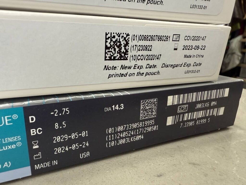 Pharmaceutical packaging with RFID and QR code labels used for secure tracking and supply chain visibility